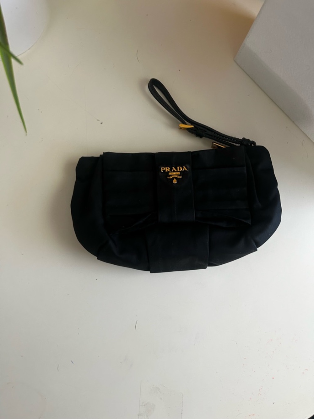 Prada Nylon Logo Ribbon Black Bow Wristlet with Gold Hardware
1N1422 - Picture 10 of 15